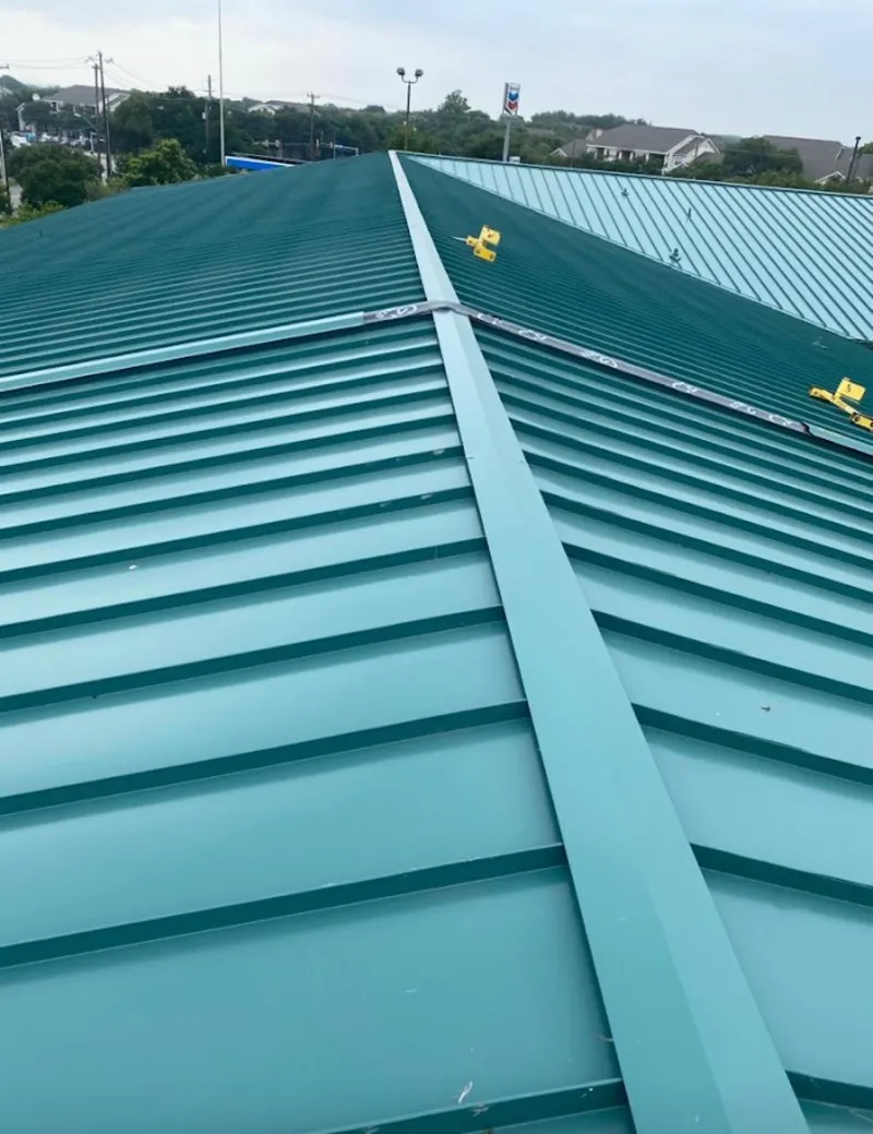 Green commercial metal roof ridge and valley for Metal Roof Repair in Rancho Santa Margarita